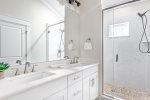 Master Bathroom with double vanity and walk-in shower.