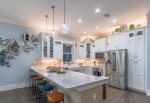 Fully stocked gourmet kitchen.