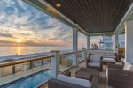 Drink a cup of coffee or a glass of wine and be mesmerized by the beautiful sky.
