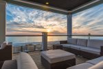 Take in the sunset views off the furnished outside deck