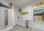Tiki Bar, half bath, and kitchenette area located on the 1st floor of No Rain.