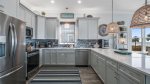 The kitchen and appliances are the perfect size to provide everyone what they need, when they need it