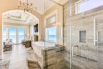 Take in the breathtaking ocean views and magnificent sunsets from both the shower and soaking tub in the west master bathroom suite on the third floor