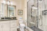 This home features 5 separate custom walk-in showers complete with rain heads.