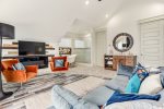 The master bedroom on 3rd floor, features an open bathroom area & garden tub.