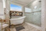 Relax in the claw tub in the master suite