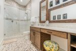 Fun and colorful bathroom connected to king bedroom