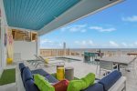 Outside pool area with ocean view.