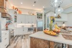Kitchen with separate refrigerator and ice maker