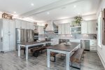First floor kitchen with 2 ovens, 2 fridges, and 2 dishwashers