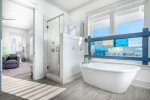 Master private en-suite with walk-in shower and large garden tub