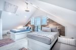 Queens with twin beds on the 4th floor, street side bedroom