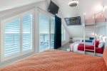 4th floor Queen bed with 4 twins, connecting balcony with beach views