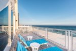 Sit on the balcony to watch the waves roll in