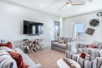 1st floor living area with direct access to the pool