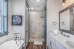 Connecting bathroom with separate tub and shower