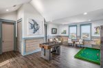 Walk up to the fourth floor for a game of foosball or a little putt-putt