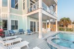 Outside seating. Loungers by the pool