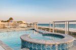 Take in the sunset and relax in the beachfront pool