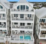 Back View of Home, Pool Deck and Furnished Balconies