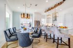 2nd floor dining table with eat in bar Seating for up to 13 guests