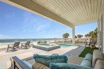 Private beachfront pool deck area
