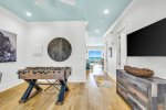 1st floor entry way with foosball
