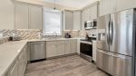 Fully equipped kitchen with stainless steel appliances