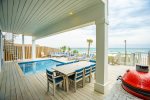 Fully furnished beachfront pool with charcoal grill