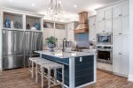 Second Floor Large Double Refrigerators and Eat-In Bar which Seats Up to 4 People