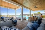 The beachfront pool deck offers ample space for everyone to lounge, eat and converse together