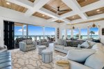 2nd floor living and dining area with accordion balcony doors