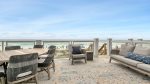 Lounge outdoors and listen to the waves roll by