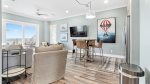1st floor living room with direct outdoor pool and beach access