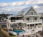 The Oasis, is a magnificent beachfront home offering 7 bedrooms, 7.5 baths