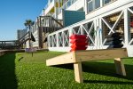 Cornhole setup on the putting green