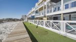 Putting green outside pool deck area