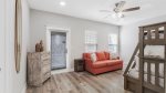 2nd floor entertainment area with furnished walkout balcony