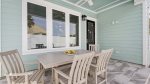 Outdoor dining table on the pool deck
