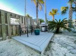 Front Deck for Outdoor Grilling with Seating and Firepit