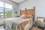 King bedroom located on the lower level with private attached bath