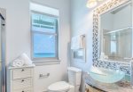 Connected bathroom with walk-in shower.