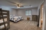 First upstair bedroom with twin bunk and king
