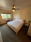 Primary Suite with King bed and bathroom