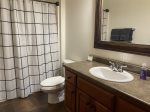 Guest bathroom with shower/tub combination
