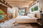 Upstairs Bedroom with Additional Sleeping Area at Aunt Judys Beach House