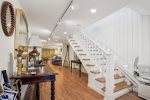 Lower Level Stair Case with Stairlift to Main Floor at Port House