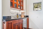 Kitchen and wet bar at Oak Street House