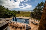 Deck with ocean view and pool at Oak Street House