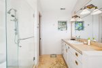 bathroom suite with 1st primary bedroom at Oak Street House